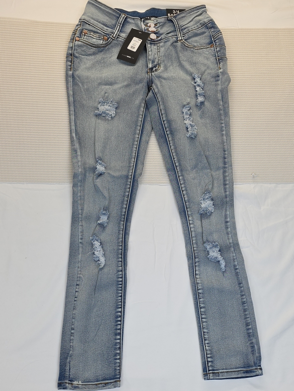 Light Wash Distressed Women’s Jeans - Slim Fit 3/4 Fashion Nova